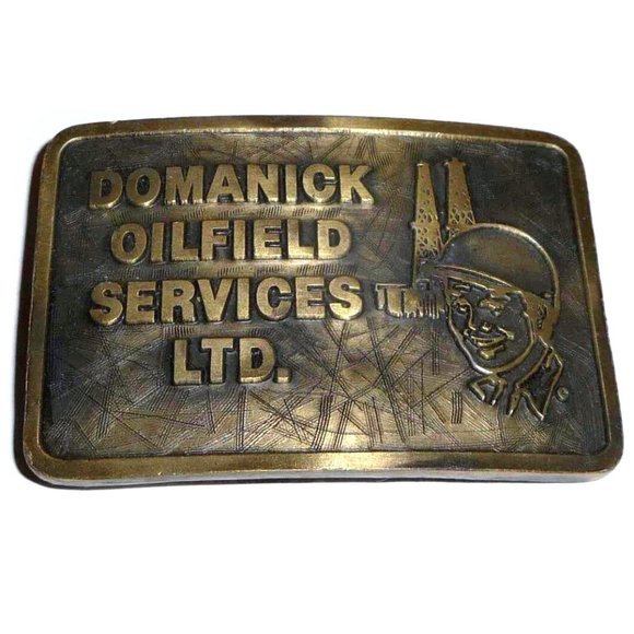 Vtg. CAT Designs Brass Belt Buckle, OILFIELD SERVICES LTD., 3.25 in. x 2.25 in. - Picture 1 of 2